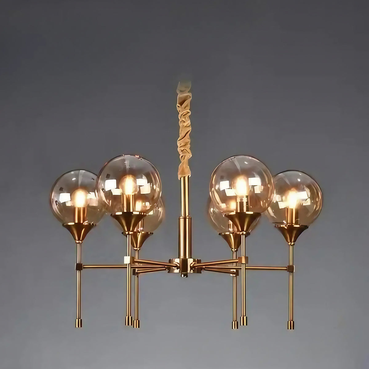 Suspension en métal doré et sphères de verre fumé, trois modèles, ambre