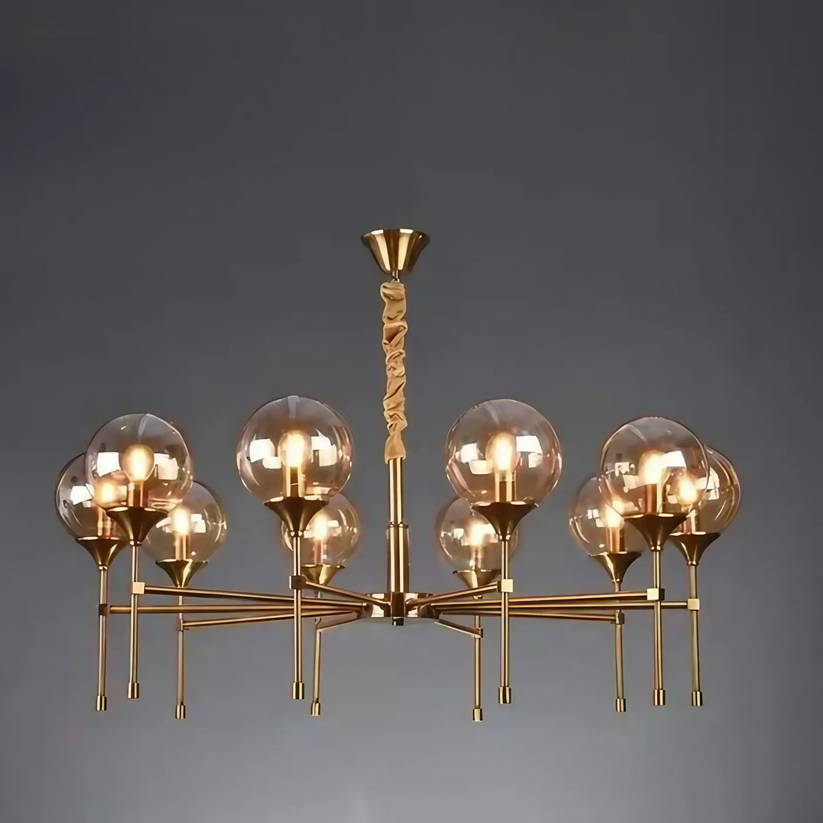Suspension en métal doré et sphères de verre fumé, trois modèles, ambre
