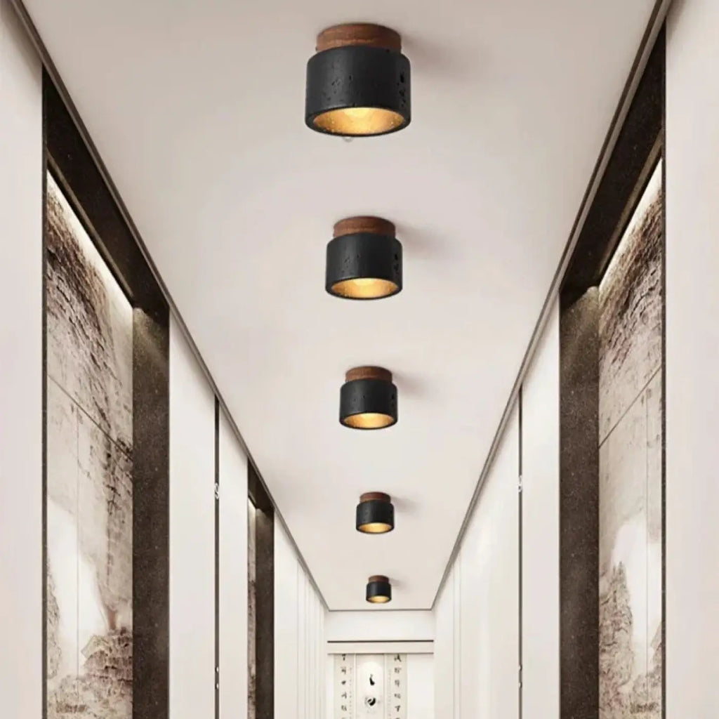 Plafonnier cylindre en marbre et noir mat, ligne épurée
