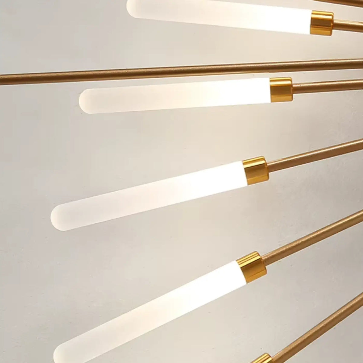 Plafonnier design à tubes lumineux rayonnants, noir ou doré