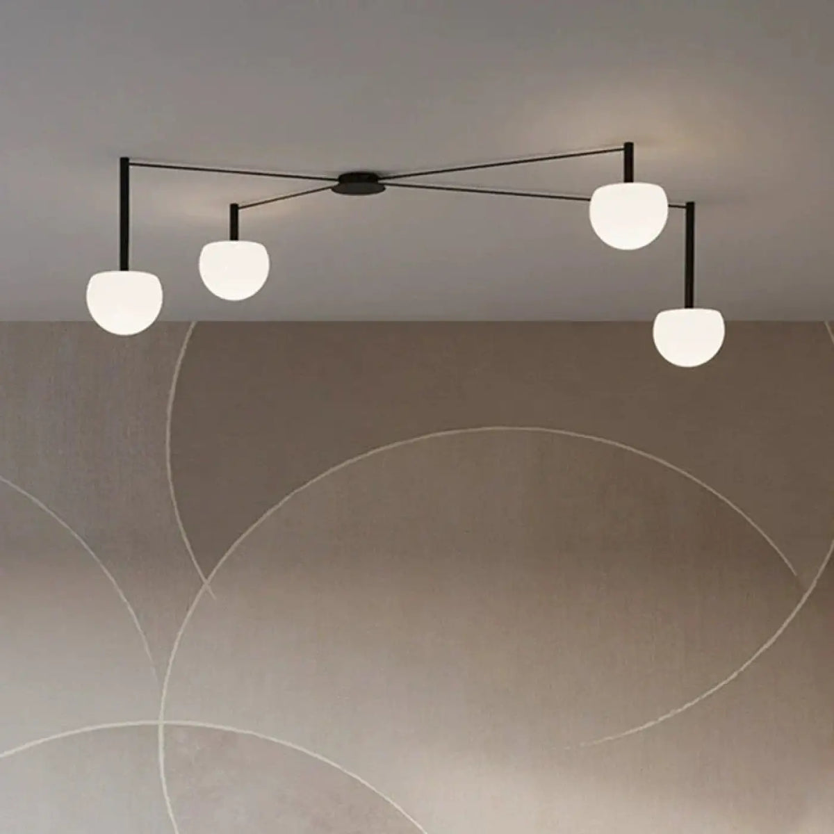 Suspension à branches noires et globes en verre opalin