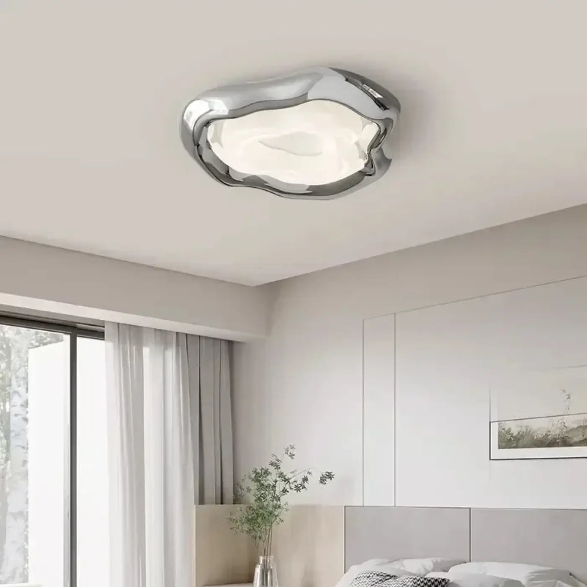 Plafonnier LED chromé aux courbes organiques, tailles S ou M
