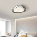 Plafonnier LED chromé aux courbes organiques, tailles S ou M