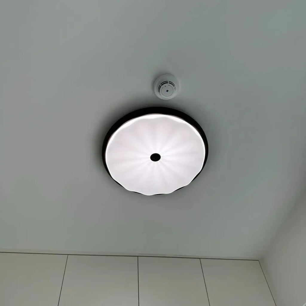 Plafonnier LED en verre ondulé, coloris noir, marron ou blanc