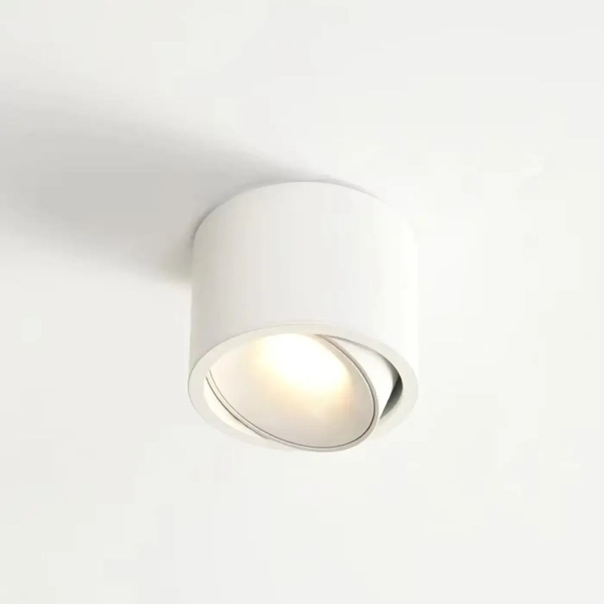 Plafonnier compact à spot orienté, forme cylindrique, blanc