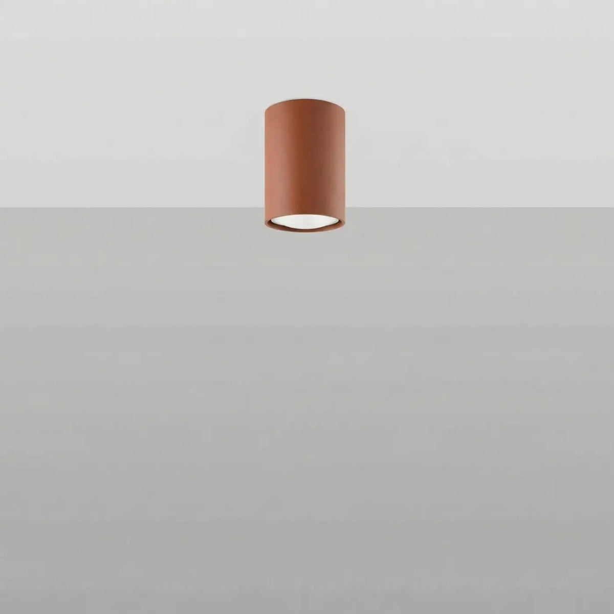 Plafonnier tube en acier lisse, seul ou par 3 ou 5 sur rosace, rouge ocre