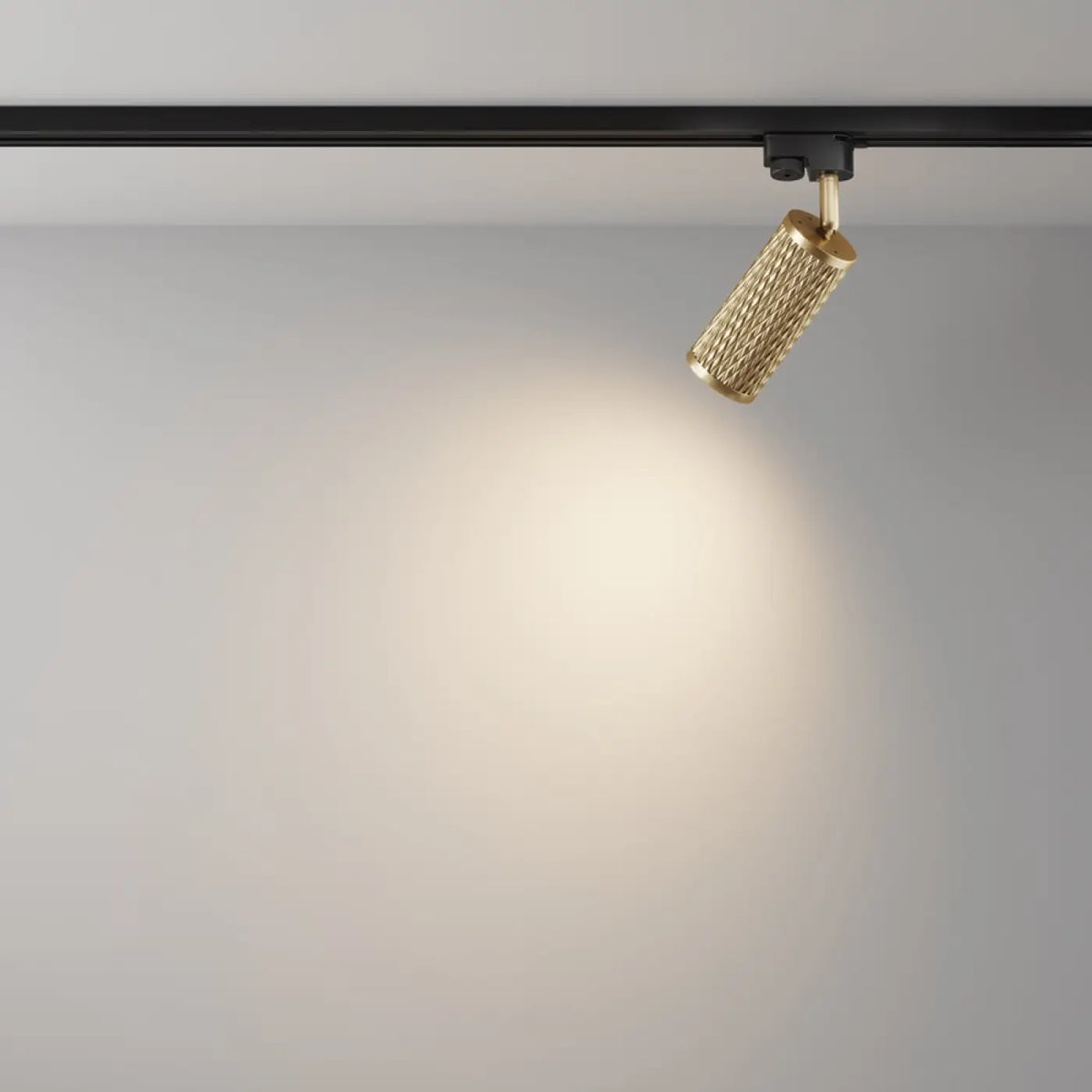 Spot orientable à tête texturée en acier, noir, blanc ou doré