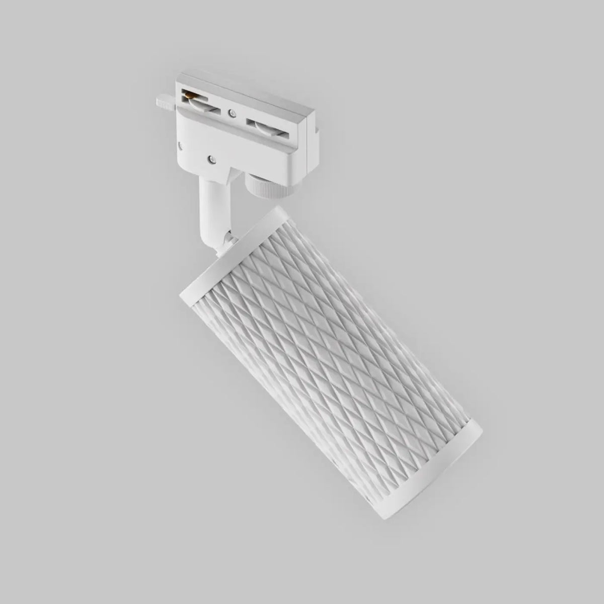 Spot orientable à tête texturée en acier, noir, blanc ou doré