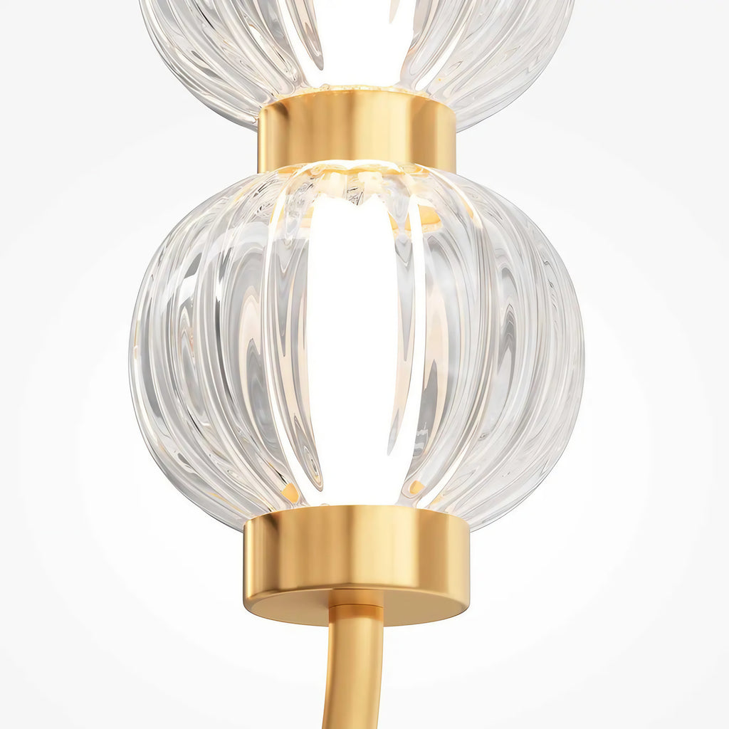 Suspension LED ovale en perles de verre strié, armature dorée
