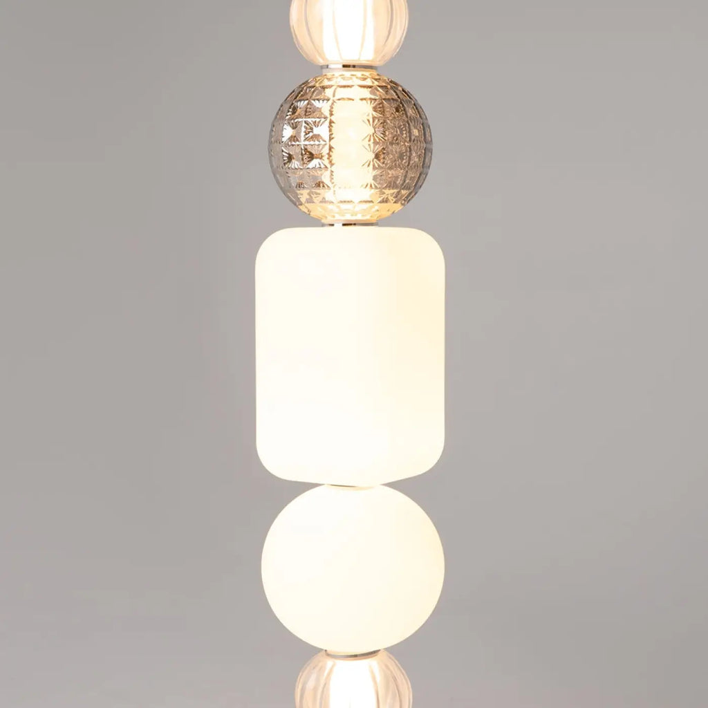 Suspension LED cinq globes en verre sur structure dorée