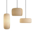 Suspension en tissu plissé, lumière douce et filtrée