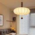 Suspension tissu beige ornée de boules en bois, tailles S et M