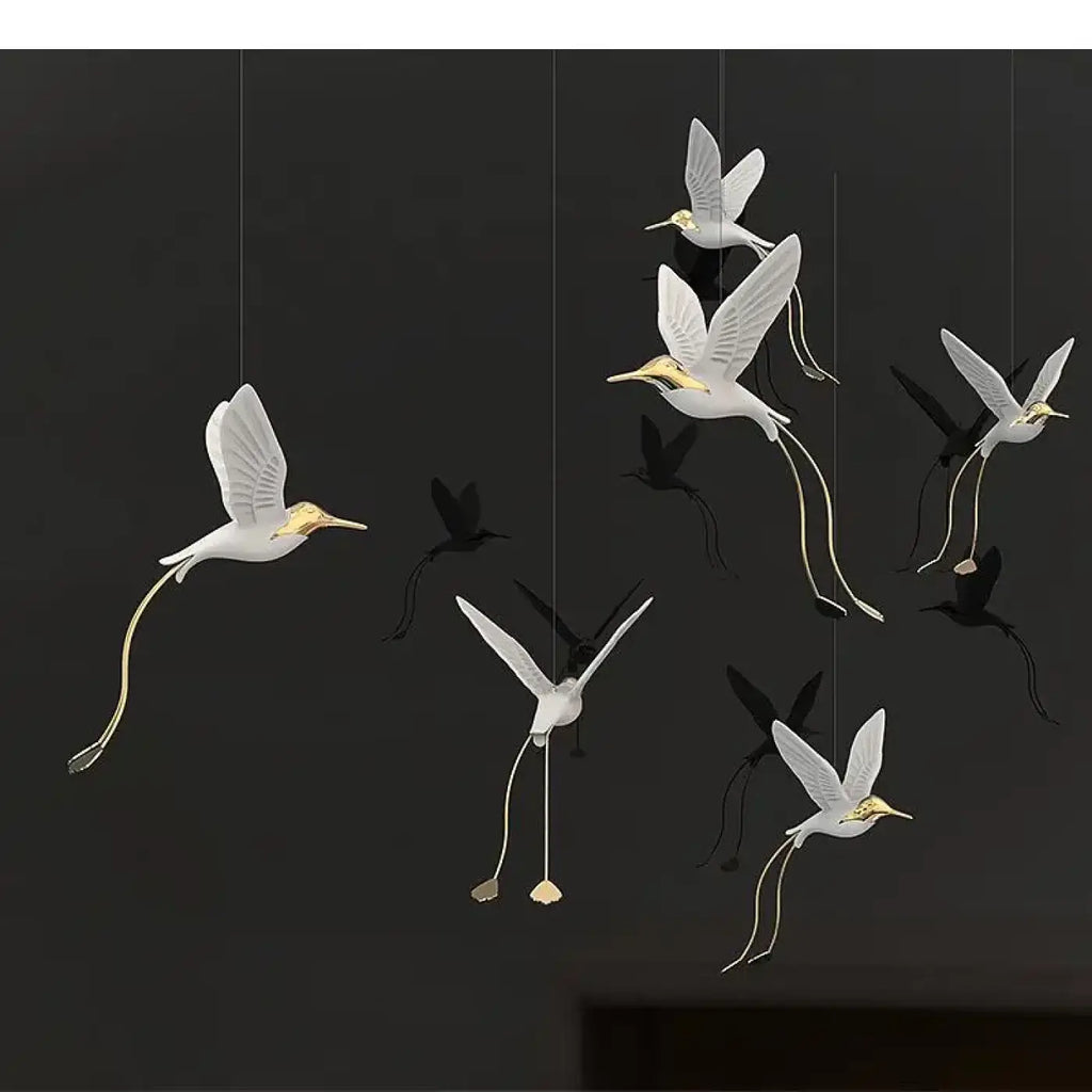 Suspension oiseaux lumineux blanc et doré, style moderne