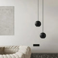 Suspension sphère noire minimaliste, finition mate