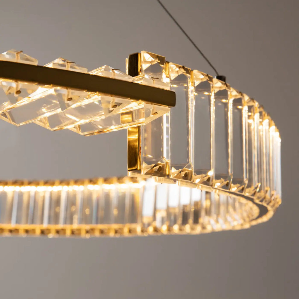 Suspension LED couronne dorée à éléments effet cristal