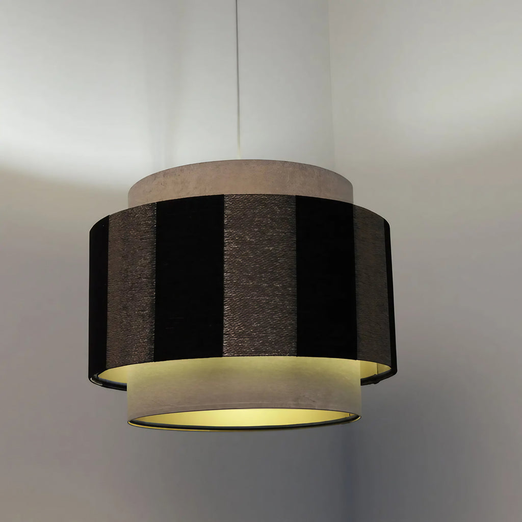Suspension double cylindre beige, noir et doré, en tissu