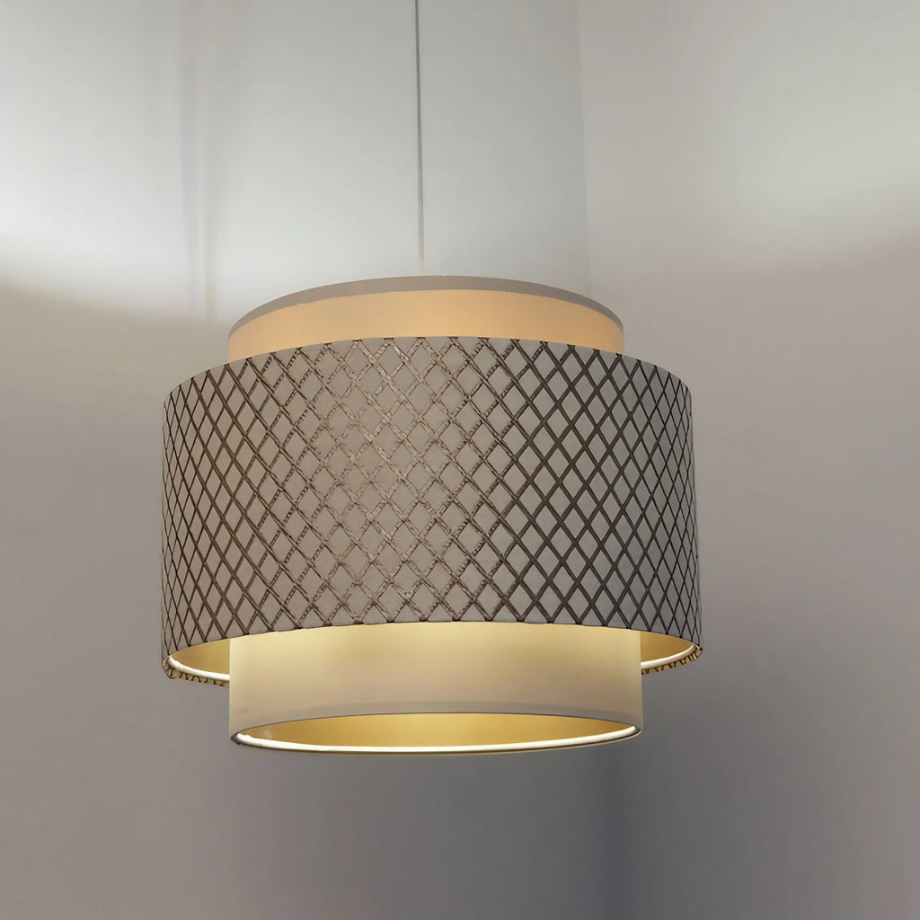 Suspension ajourée blanc crème et doré, double cylindre en tissu