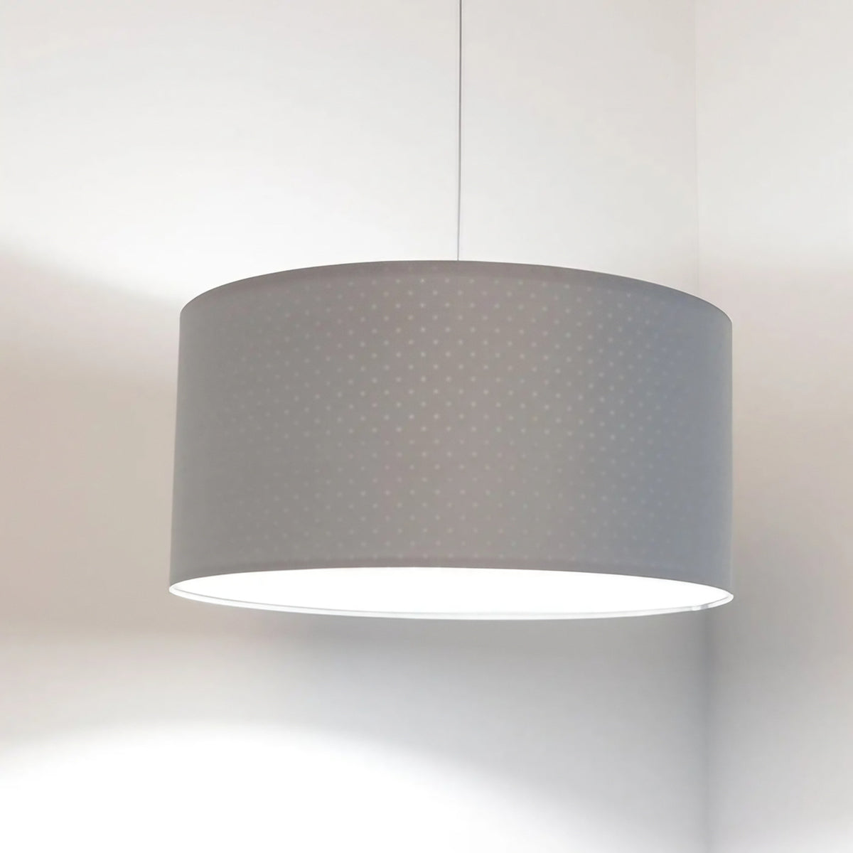 Suspension cylindrique en tissu bleu pastel, intérieur blanc