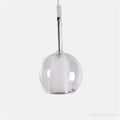 Suspension boule en verre teinté, quatre teintes dont or rose, transparent