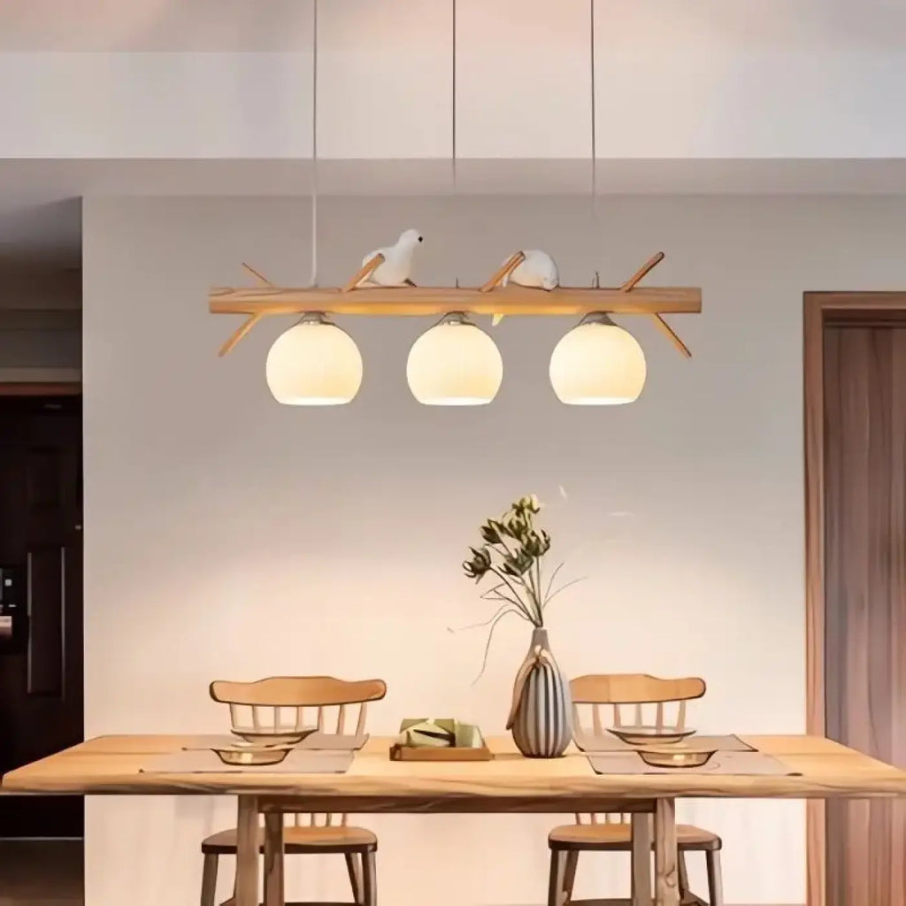 Suspension décorative aux oiseaux en bois clair, deux modèles