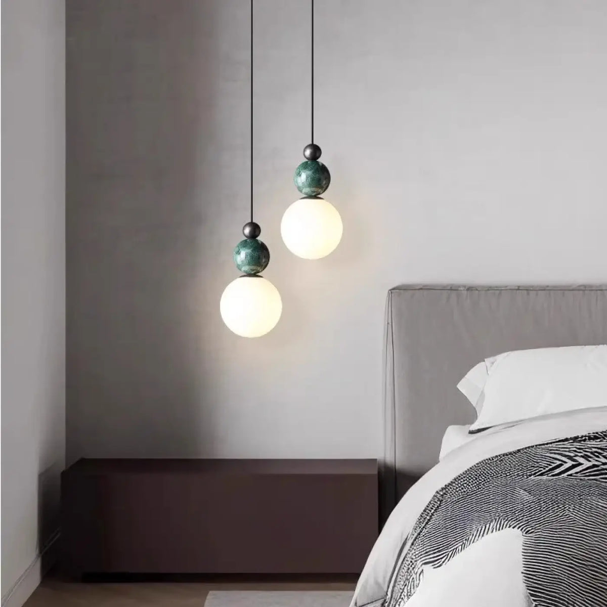 Suspension design à globe lumineux, noir ou vert