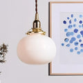 Suspension en verre et monture dorée, quatre coloris de verre, blanc