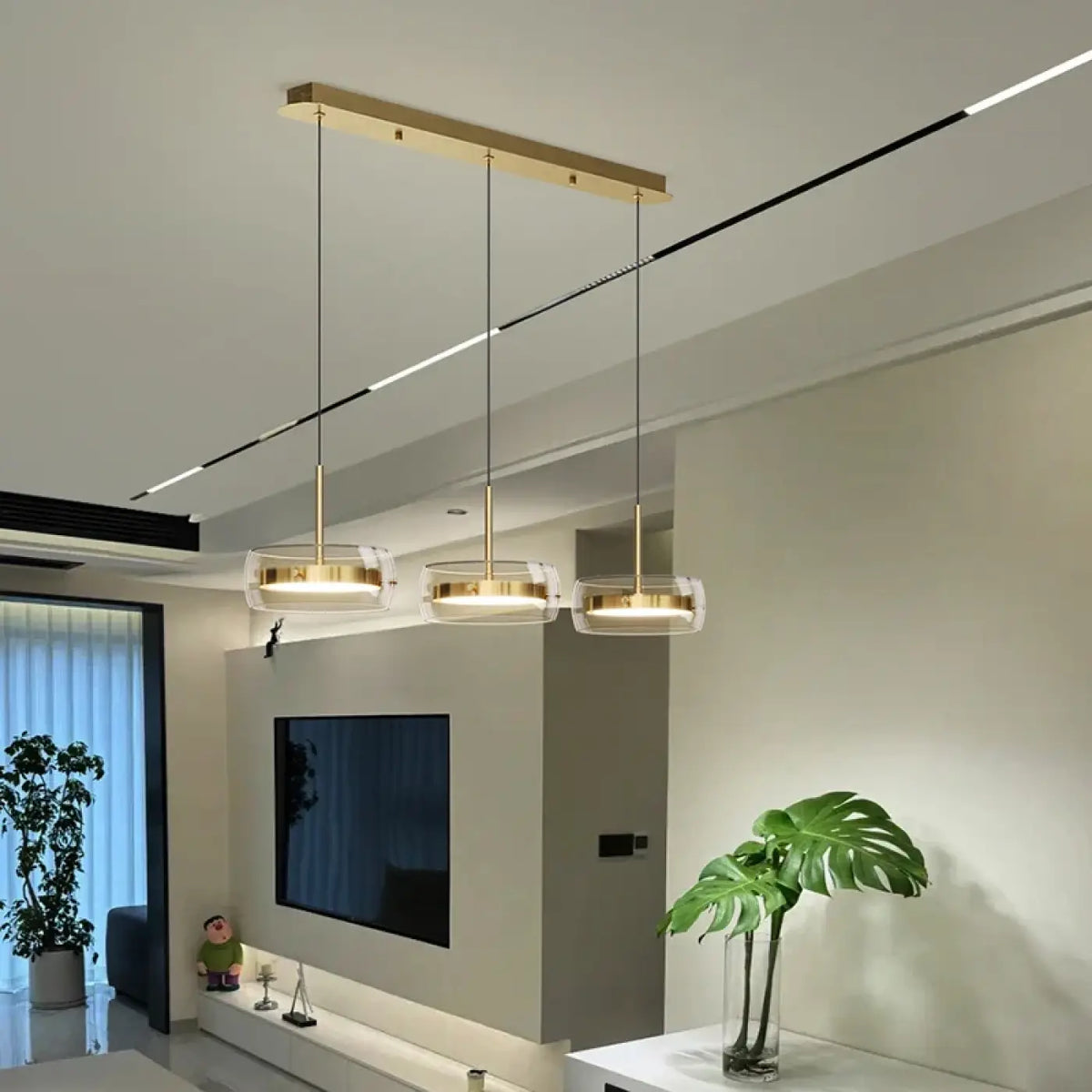 Suspension dorée à trois têtes LED, design moderne
