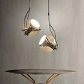 Suspension boule en verre marron avec spot LED argenté