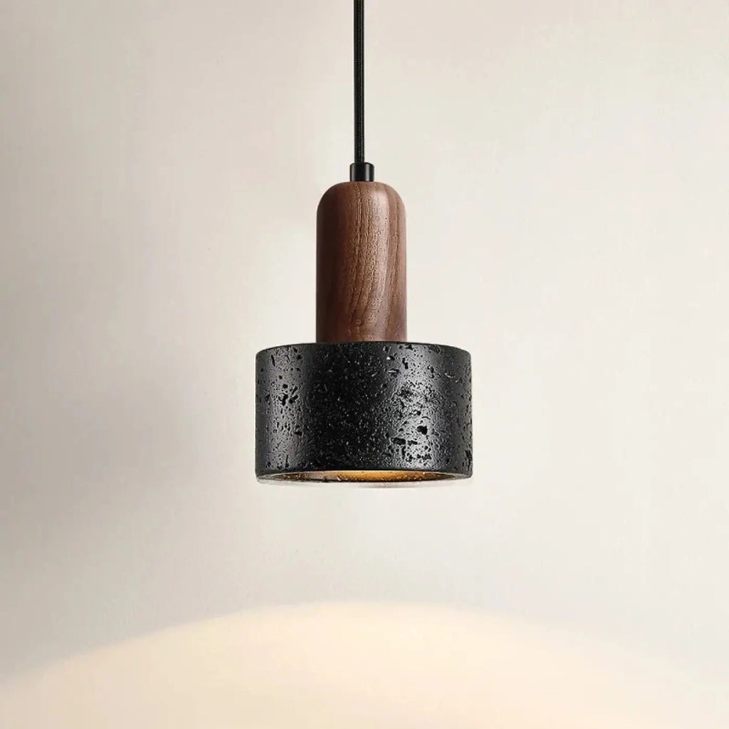 Suspension en pierre noire et bois naturel, style minéral