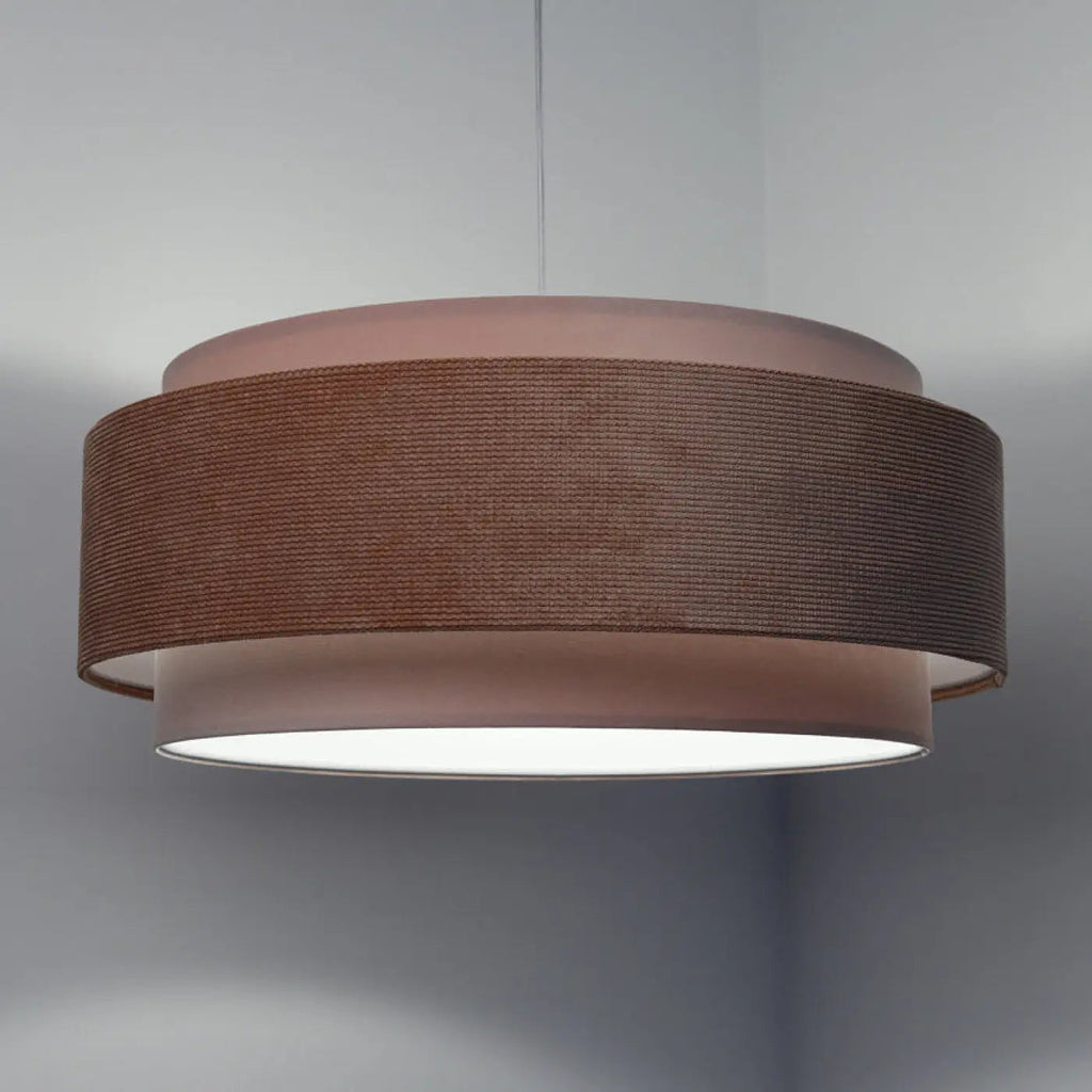 Suspension en tissu rose pâle et blanc, lumière tamisée