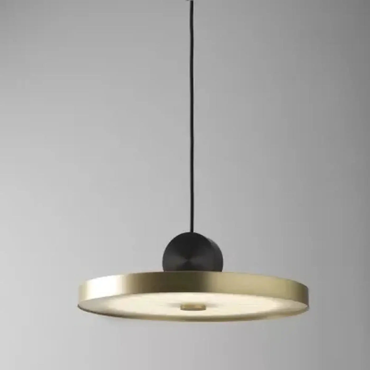 Suspension ronde noire à touches dorées, style moderne