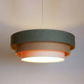 Suspension luminaire vert gris, crème et beige, style moderne
