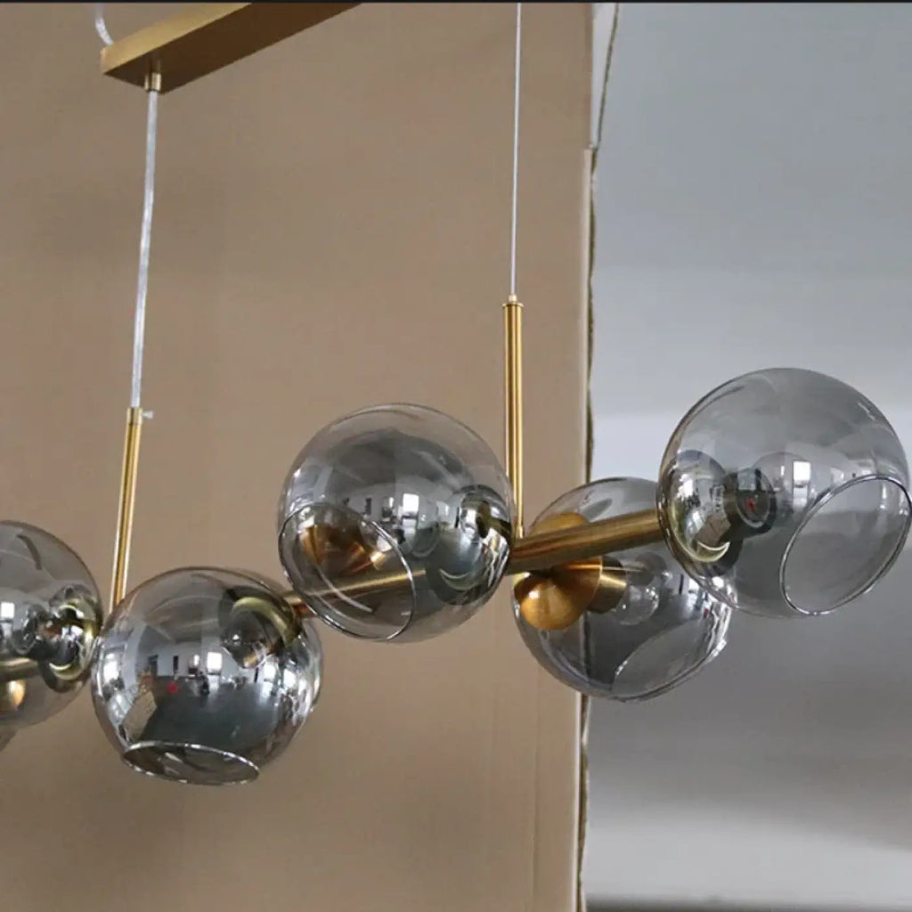 Suspension à globes en verre, monture dorée ou noire