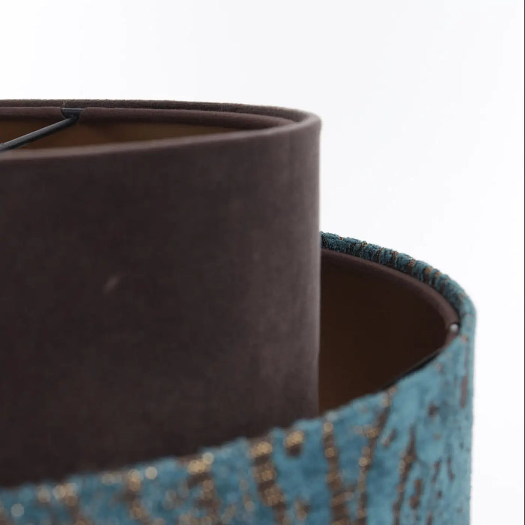 Suspension en tissu turquoise et marron, détails cuivrés