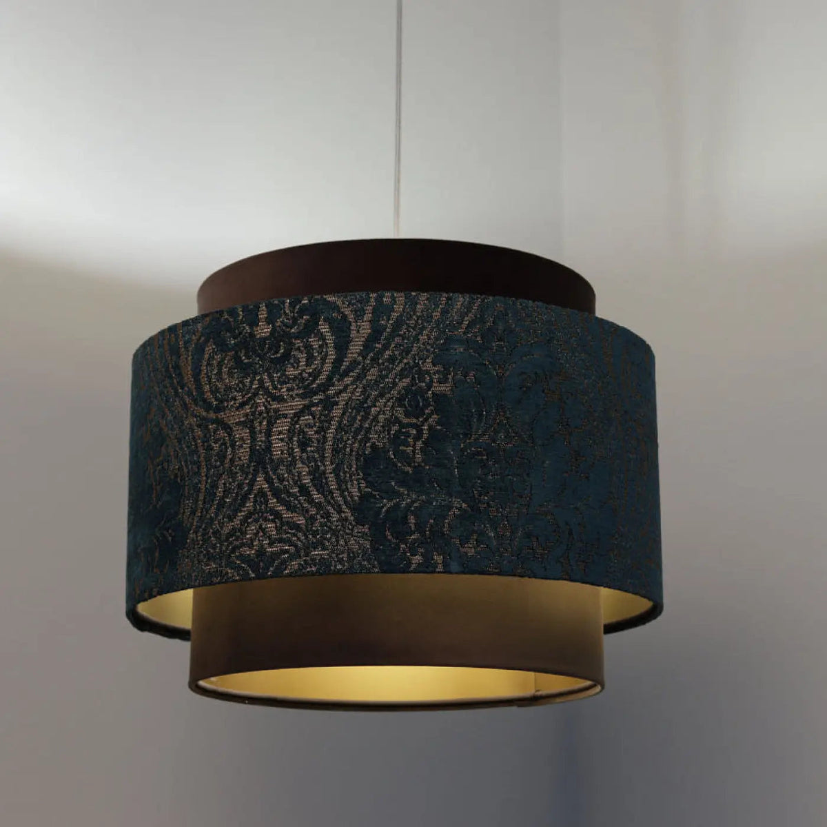 Suspension en tissu turquoise et marron, détails cuivrés