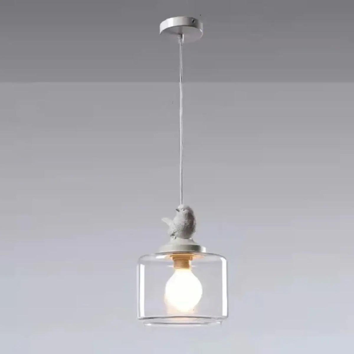Suspension en verre gravée d'un oiseau blanc