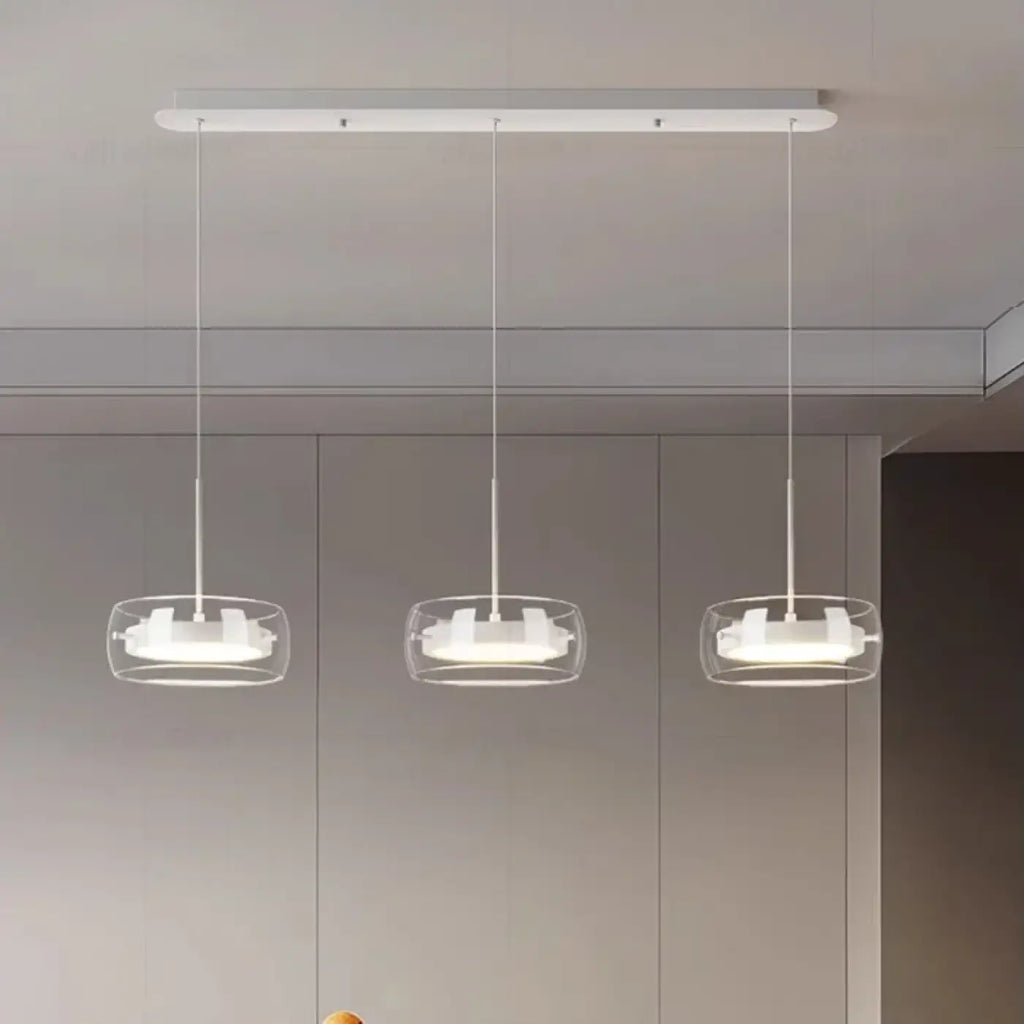 Suspension trio en verre transparent à LED intégrée