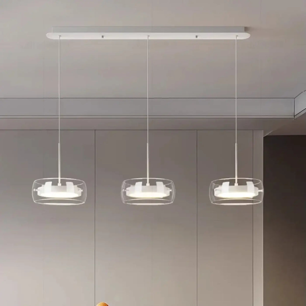 Suspension trio en verre transparent à LED intégrée
