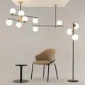 Suspension linéaire à globes opalins, barre noire et dorée, 95 cm