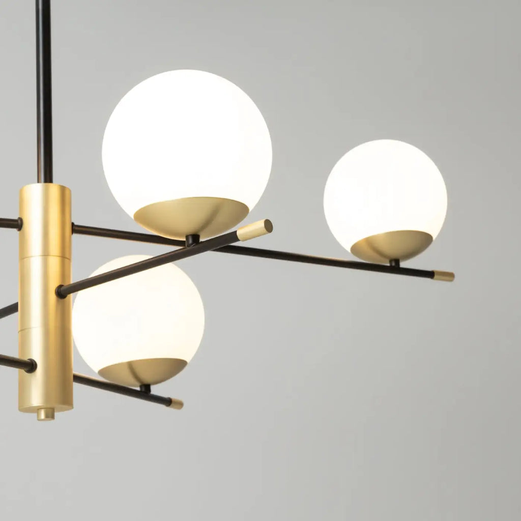 Suspension six globes opalins, acier noir et doré, 100 cm