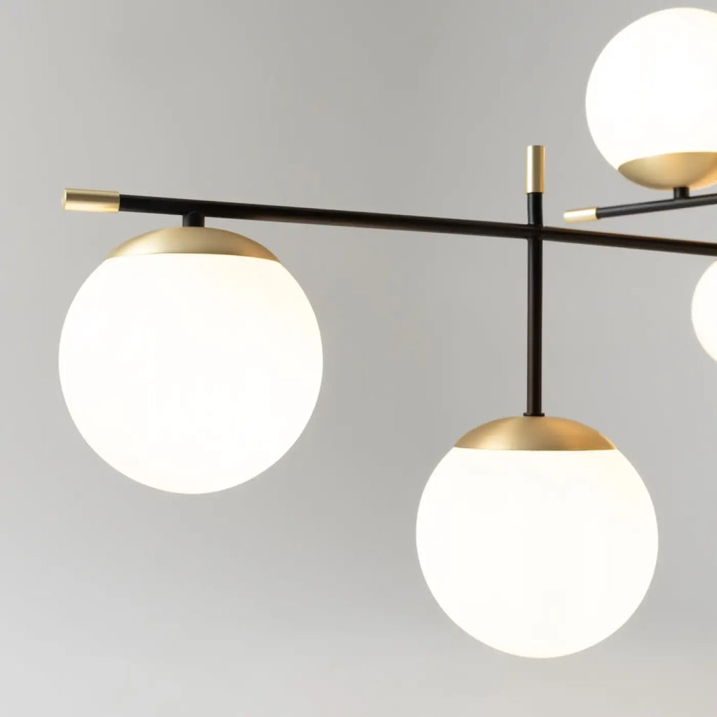 Grand lustre à neuf globes opalins, 131,5 cm, acier noir et doré