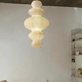 Suspension en papier blanc aux formes organiques