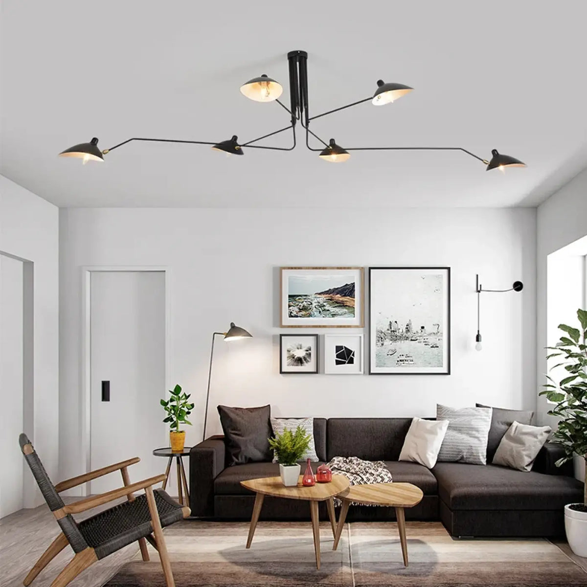 Suspension industrielle noire à trois bras orientables
