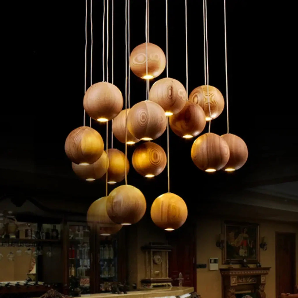 Suspension sphères en bois naturel, quatre tailles S à XL