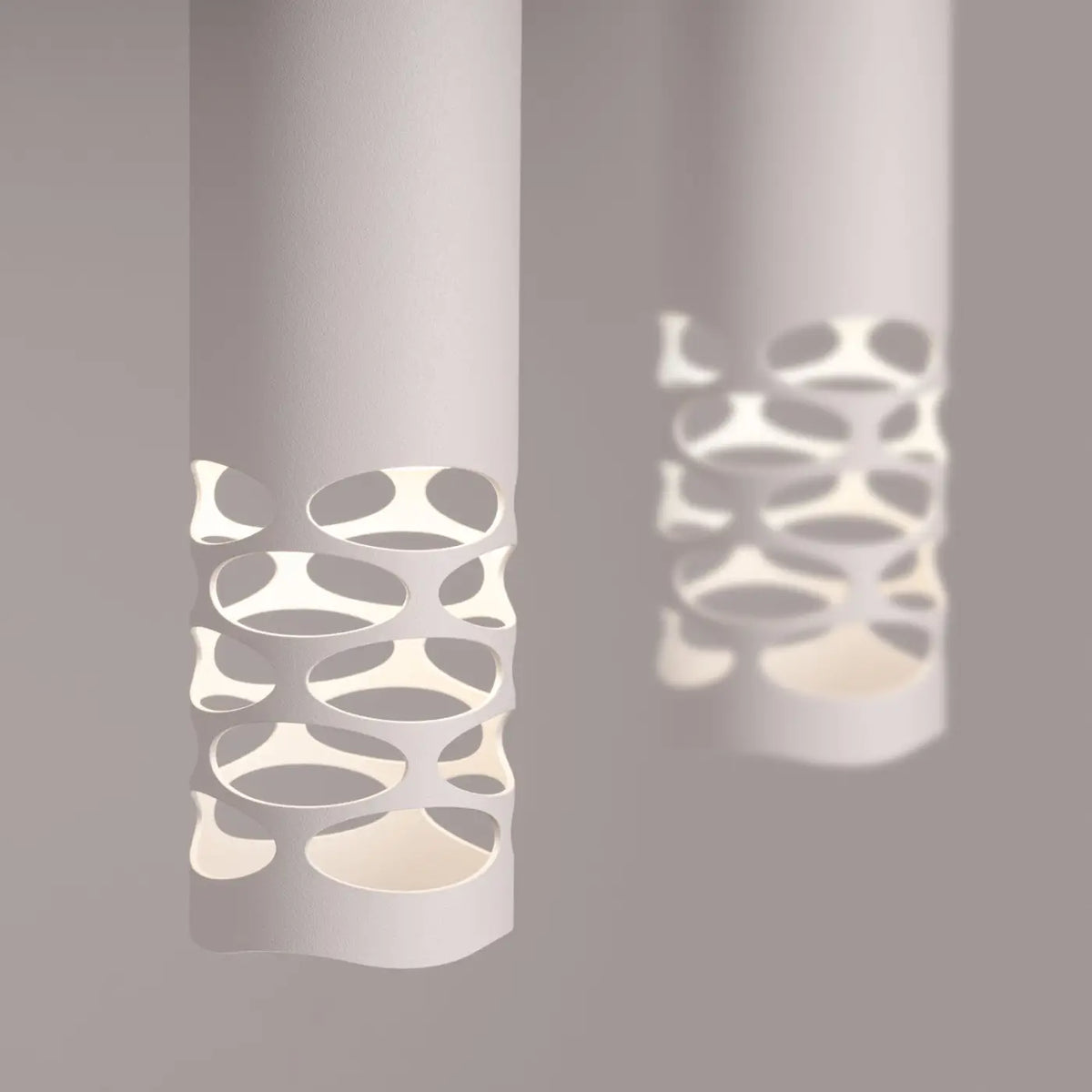 Suspension tube en acier blanc, bas ajouré d'ovales, GU10