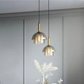 Suspension art déco en verre fumé et laiton, deux modèles