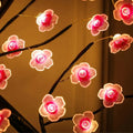 Arbre lumineux à fleurs roses, à poser