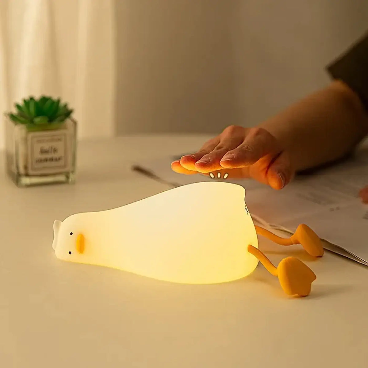 Veilleuse canard aux formes arrondies, lumière douce