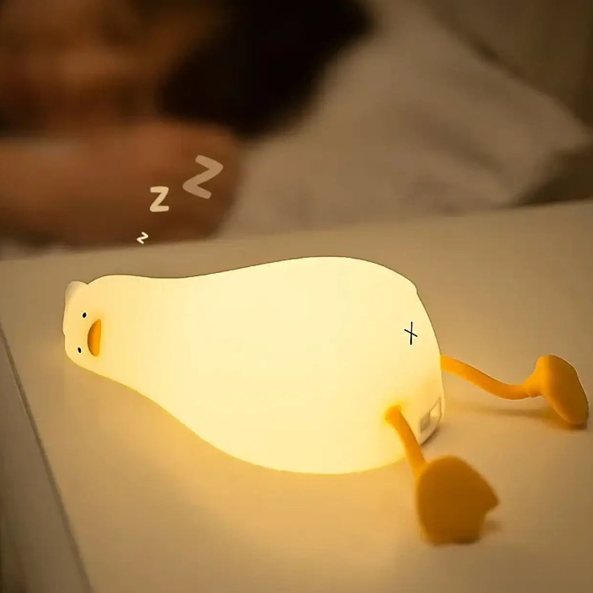 Veilleuse canard aux formes arrondies, lumière douce