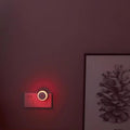 Veilleuse ronde sur prise, lumière rouge tamisée